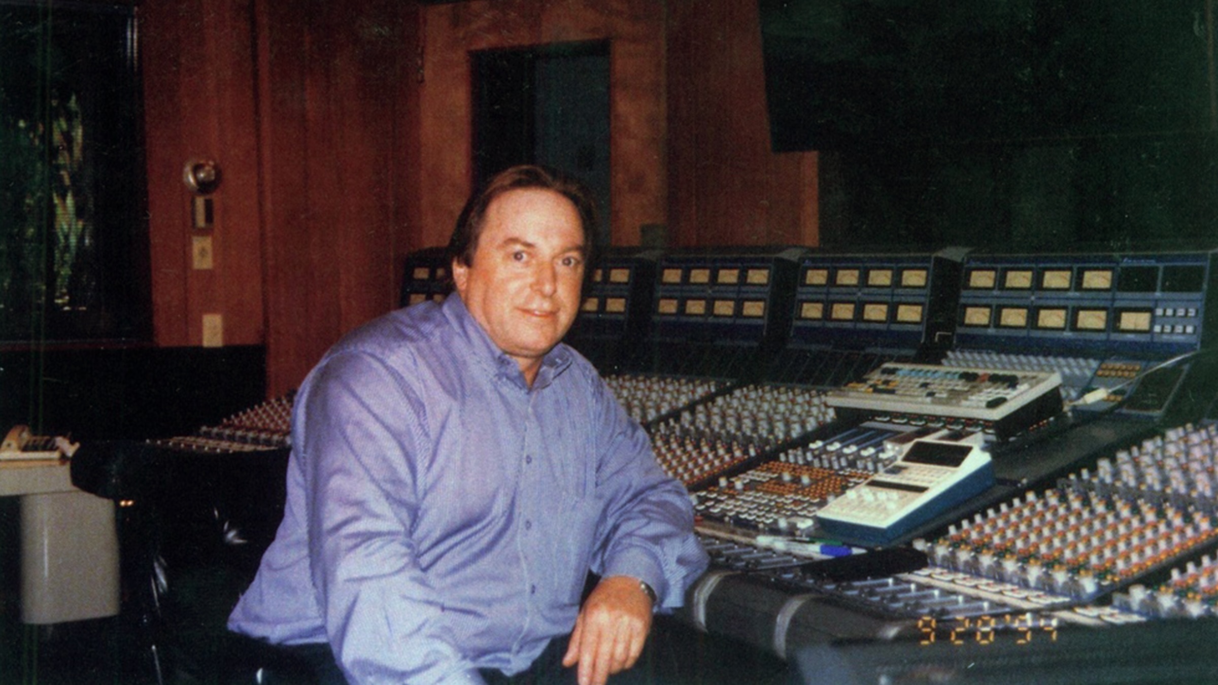 Picture of Phil Dudderidge in-front of a Focusrite Console
