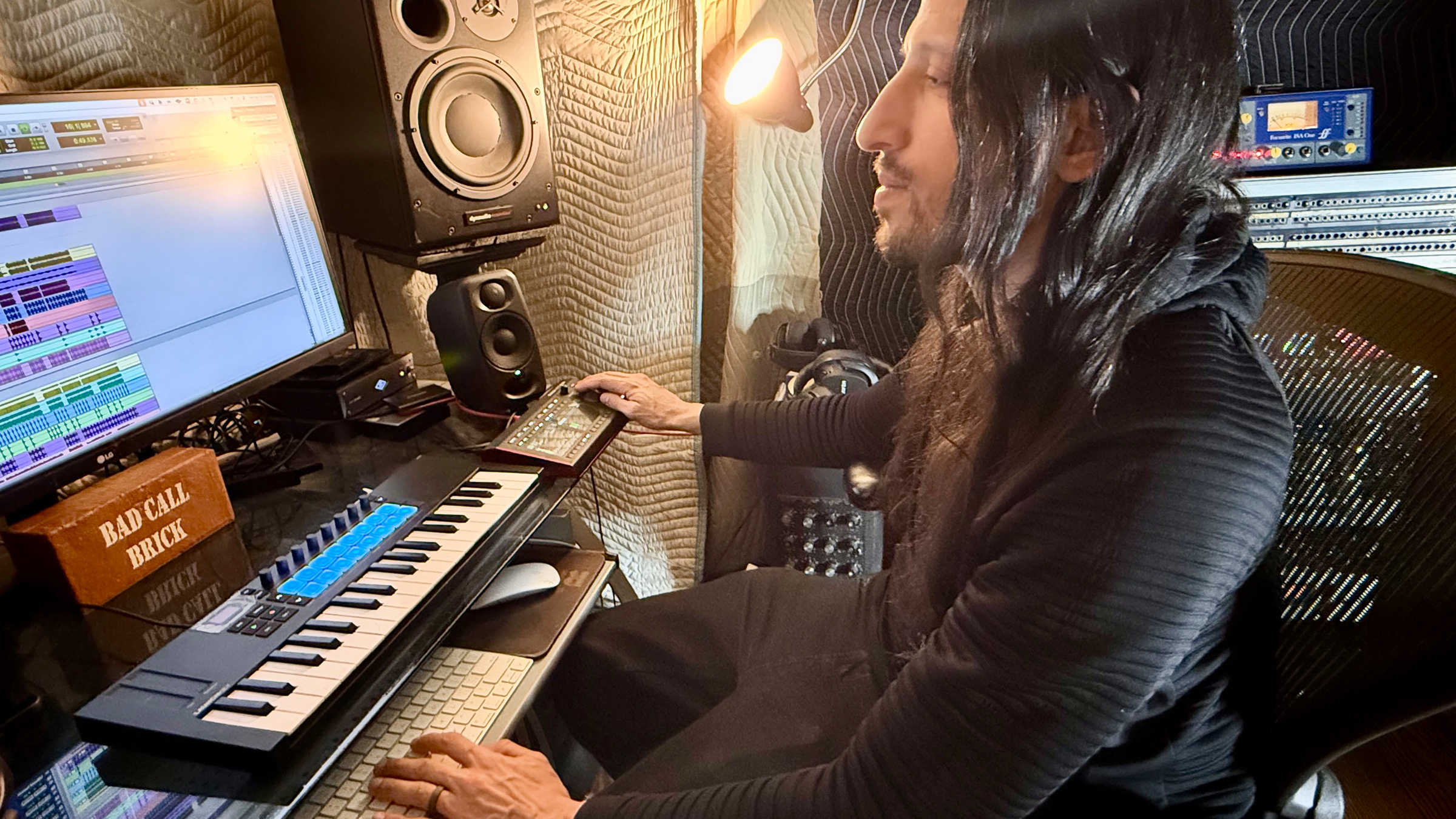 Josh Gannet, pictured with some of his gear components, including a Focusrite Red 8Line interface.