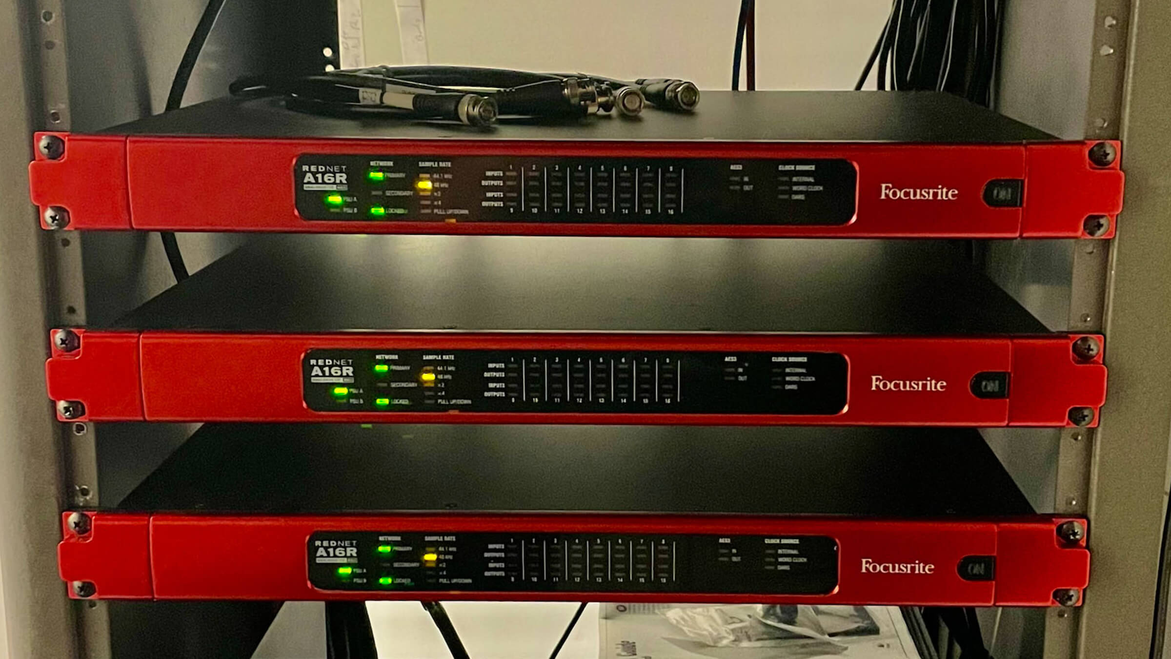 Gear rack configured for Ithaca College Recording Services setup, including several Focusrite RedNet interfaces